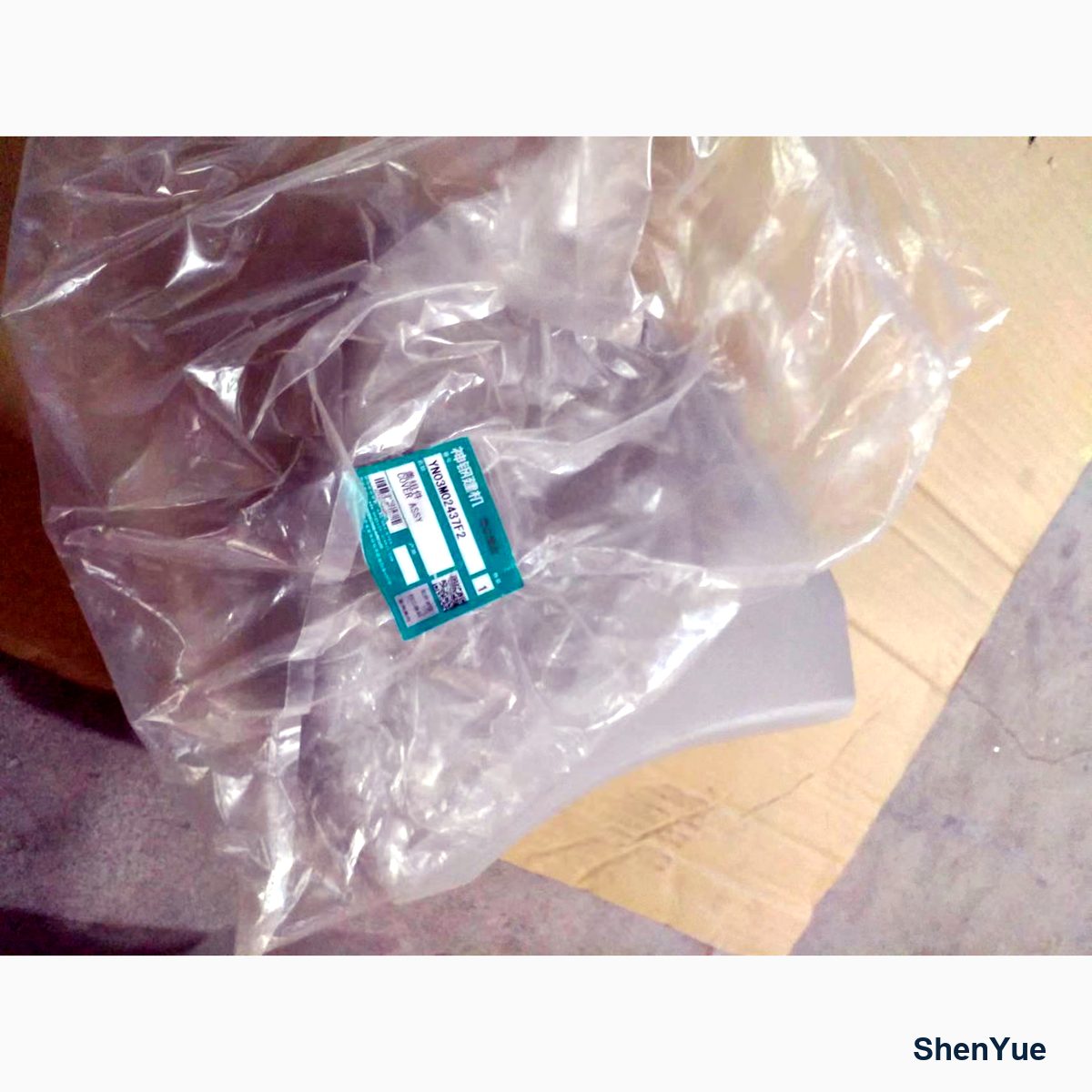 Cover of Right Hand YN03M02437F2 Kobelco part — real photo from our Guangzhou warehouse